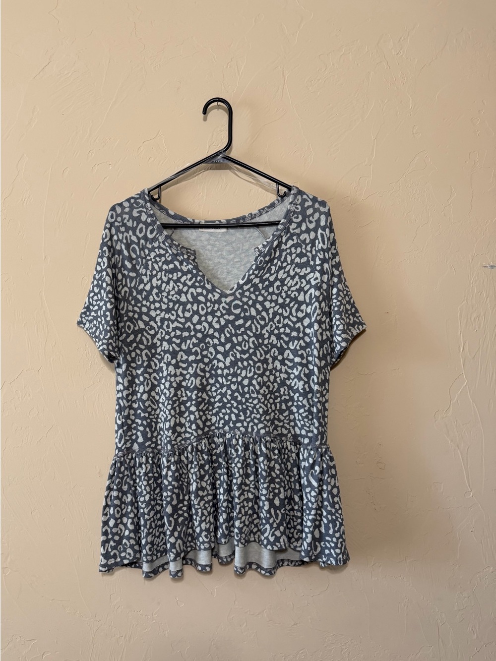 ADORA Light Blue Leopard Print V-Neck Peplum Top
New without tags
